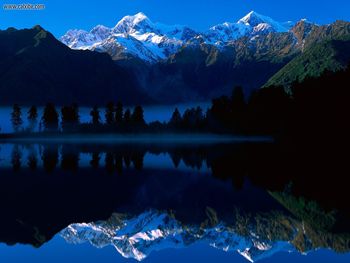 Lake Matheson Reflects Mount Tasman And Mount Cook New Zealand screenshot