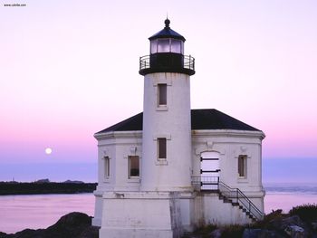 Coquille River Lighthouse And Moonset Bullards Beach State Park Oregon screenshot