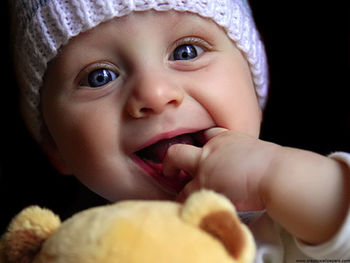 Cute baby playing doll screenshot