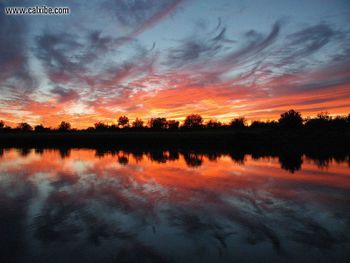 Swirling Sunrise Over Lake screenshot