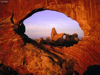 Turret Arch Through North Window Arch Arches National Park Utah screenshot